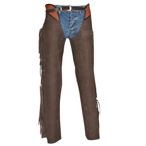 May include: Brown leather chaps with fringe detailing on the outer legs. The chaps are worn over blue denim jeans and a brown leather belt with a silver buckle. The top of the chaps has a brown and tan leather design.