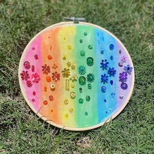 Rainbow color flower beaded embroidery art, handmade with glass and plastic beads and sequins, 7 inch hoop