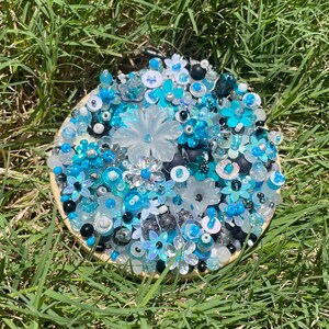Blue, black and white flower beaded embroidery art, handmade with glass and plastic beads and sequins, 4 inch hoop