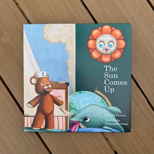 The Sun Comes Up, folding children&#39;s book with fine art prints