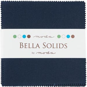 May include: A stack of square navy blue fabric pieces with pinked edges, secured by a white paper band. The band features the text "moda BELLA SOLIDS by moda" in brown and black, accompanied by a row of small colored circles in green, blue, and brown.