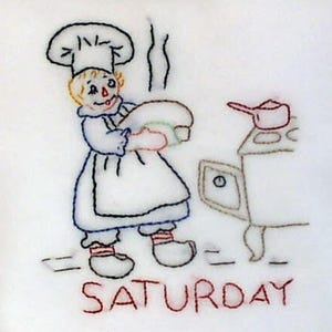 May include: A hand-stitched embroidery design of a chef holding a loaf of bread, standing in front of a stove with a pot on top. The text "SATURDAY" is stitched below the image.
