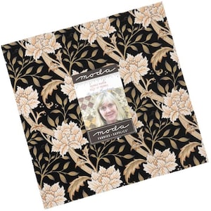 May include: Moda Fabrics - Supplies, a black fabric with a floral pattern in shades of gold and cream. The fabric features a repeating design of stylized flowers and leaves.