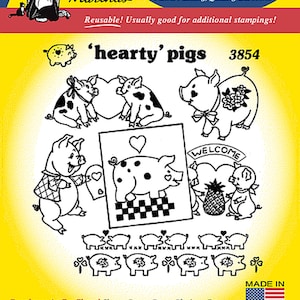 May include: Iron-on transfer sheet featuring a design of 'hearty' pigs with hearts and a welcome sign. The sheet is reusable and includes multiple stamps. The design is black and white and is on a yellow background. The sheet is labeled '3854'.