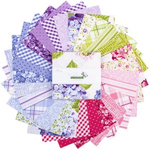 May include: A set of three ceramic mugs with a speckled, matte finish. The mugs are in shades of cream, light brown, and dark brown. Each mug has a simple, minimalist design, perfect for coffee or tea.