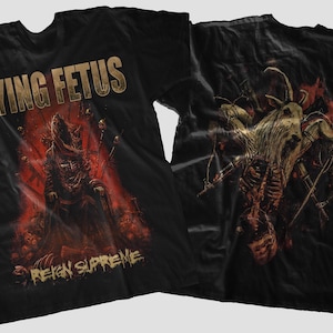 Puede incluir: Camiseta negra con el nombre de la banda "DYING FETUS" en letras doradas. El frente presenta una ilustración roja y marrón de una criatura, con "REIGN SUPREME" debajo. La parte posterior muestra un gráfico similar.