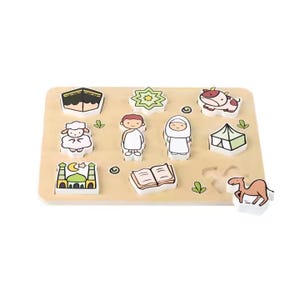 May include: Wooden puzzle featuring Islamic-themed shapes and figures. Includes a mosque, Kaaba, people, animals, and other symbols. The puzzle pieces are colorful and designed for young children. The base is a light brown color.