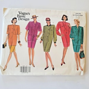 May include: Vogue's Basic Design pattern envelope 2635 for sizes 8-10-12. The illustration features five variations of a button-front dress with patch pockets in orange, purple, olive green, red, and teal. Each figure displays a different sleeve length.