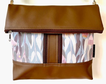 Cross body zipper vegan bag with gum tree nut fabric pockets on the front