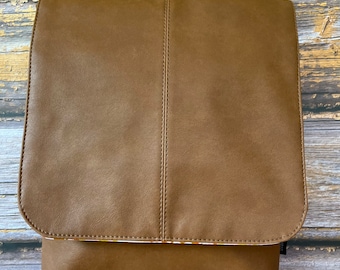 Russet coloured vegan faux leather cross body bag