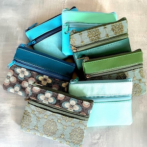 Small vegan two zip purse pouch in blue, teal and green.