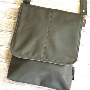 Grey coloured vegan leather cross body bag