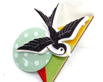 Swallow brooch bright coloured happy bird spot button pin