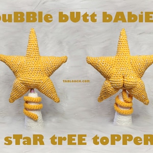 May include: A crochet star tree topper in yellow and white. The star has a rounded, bubble-like shape at the bottom, and the text "bubble butt babies" and "star tree topper" is written in the image.