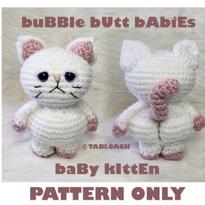 May include: A crochet pattern for a white cat with pink ears, paws, and tail. The cat is sitting with its back to the viewer, showing off its round, fluffy backside. The pattern is called "bubble butt babies" and is available for purchase.