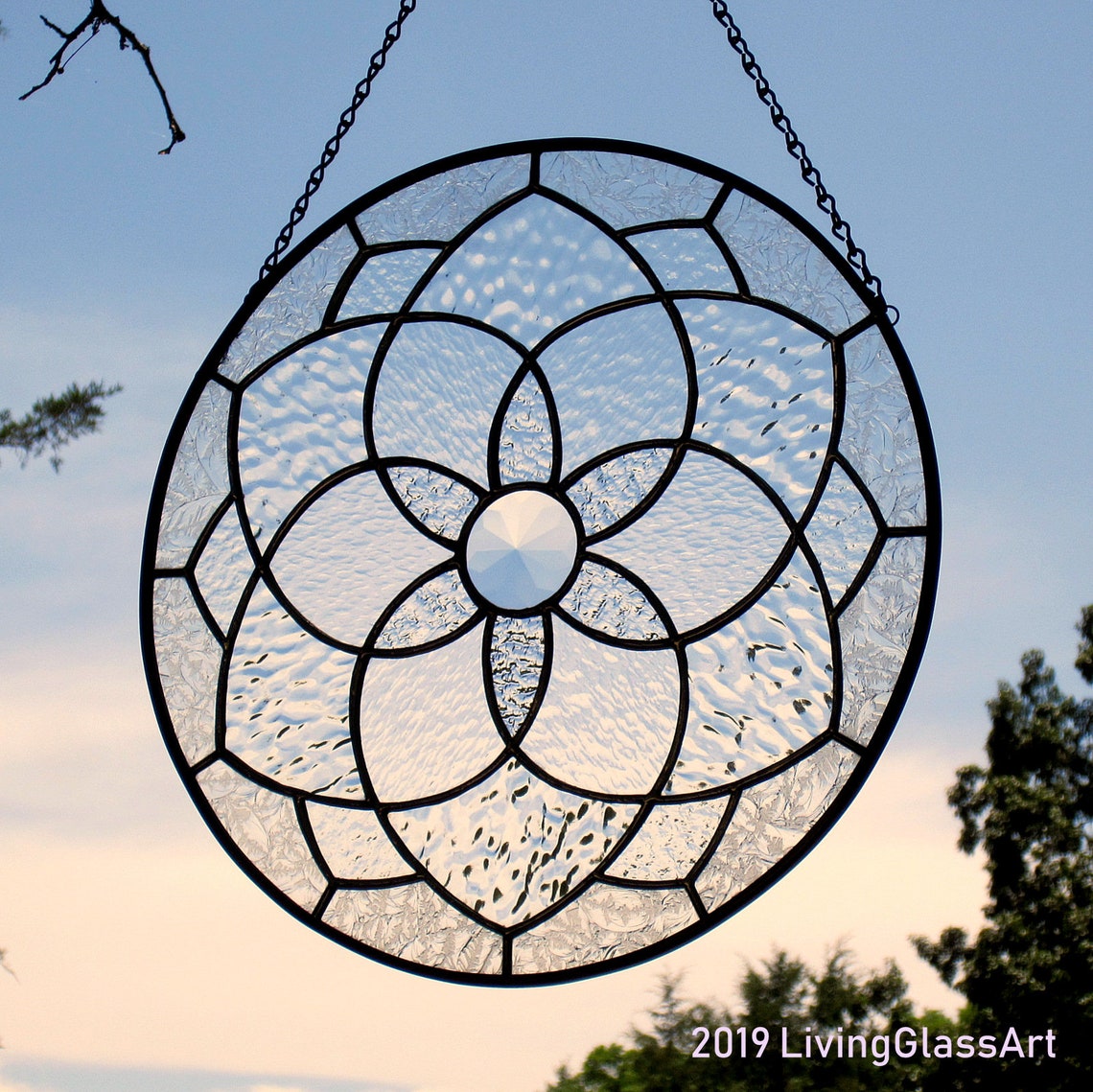 Stained glass suncatcher quilt pattern in aqua blue rose