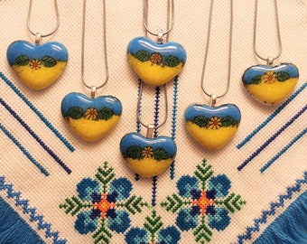 Blue and Yellow fused glass Heart for Ukraine with flowers and leaves wearable art pendant 20 inch chain