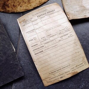 WW2 Era US Civil Defense Steel Helmet with Air Warden Reporting Documents