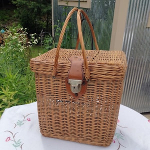 Vintage picnic storage basket with handles and cover and latch