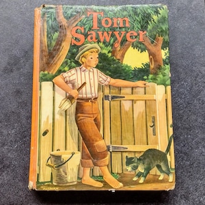 Vintage Tom Sawyer by Mark Twain Copyright 1944 by Whitman Publishing Company Racine Wisconsin