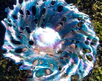 Luminescent aqua blue and clear swirly holey whirlpool splash bowl