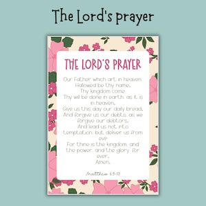 May include: A rectangular print featuring "The Lord's Prayer" in a decorative floral frame. The text is centered on a white background, with pink and green floral accents. The title "The Lord's Prayer" is at the top.