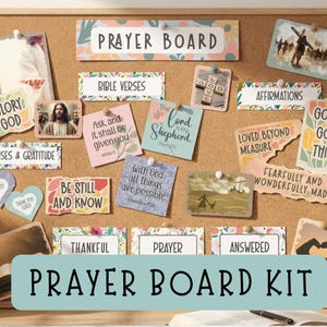 May include: A cork noticeboard displaying a collection of inspirational cards and images, including Bible verses and affirmations. The cards are pinned to the board and feature floral and watercolour designs. The text "Prayer Board Kit" is also visible. The theme is faith.