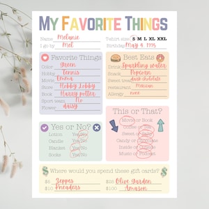 May include: A personalized "My Favorite Things" printable sheet with pastel colors. The sheet includes sections for favorite things, best eats, and "this or that" choices. The name "Melanie" and the date "May 4, 1995" are visible.