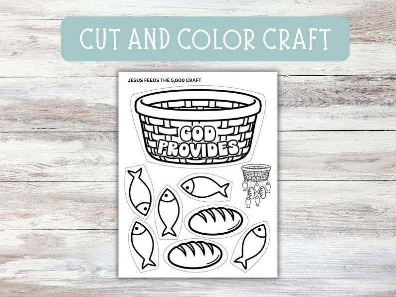 May include: A black and white cut-and-color craft sheet with the text "CUT AND COLOR CRAFT" at the top. The sheet features a basket with the words "GOD PROVIDES", fish, and loaves of bread. The text "JESUS FEEDS THE 5,000 CRAFT" is also present.