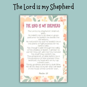 May include: A decorative print with the text "The Lord is my Shepherd" at the top. The main text is a passage from Psalm 23, surrounded by a floral border in pastel colors. The background is a light teal.