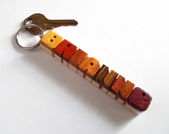 Custom Exotic Woods Sampler Name Keychain on Maple, Carved to Order