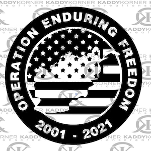 May include: Black and white circular sticker with an American flag design and the text "Operation Enduring Freedom 2001 - 2021".