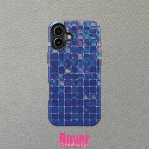 May include: A blue phone case with a mosaic tile design. The case has a glossy finish and features a grid pattern of small, square tiles in varying shades of blue. The phone's camera lenses are visible at the top.