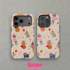 May include: Two phone cases with a repeating pattern of circus cats. The cats are dressed in colorful outfits, riding unicycles, and holding balloons. The background is a cream color with hearts and stars.