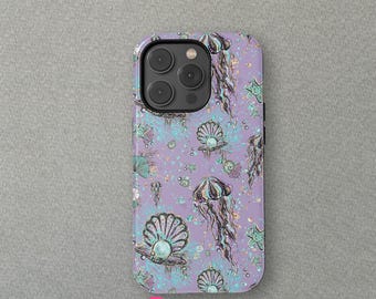 May include: A purple iPhone case with a pattern of seashells, jellyfish, and stars. The case has a clear camera lens cutout.