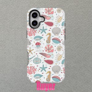 May include: A white phone case with a colorful pattern of seashells, starfish, and seahorses. The case has a cutout for the camera lens.