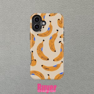 May include: A phone case with a repeating pattern of yellow bananas with blue accents on a beige background. The case has a dual-lens camera cutout and the text "Ruver CrossBorder" in pink.