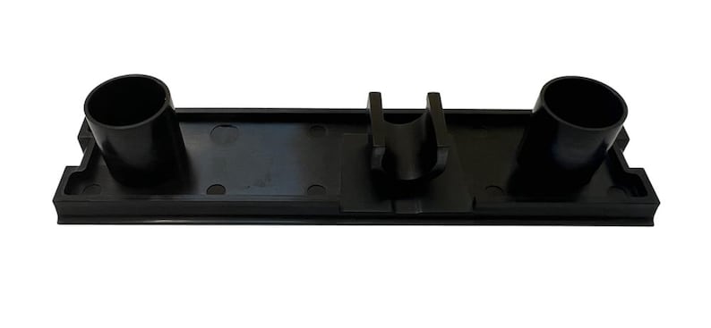 May include: Black plastic vacuum cleaner attachment holder with two round openings and a centre clip.