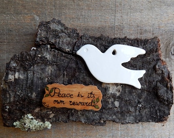 Peace Gandhi Quote - Porcelain White Dove on a Natural Oak Bark by Tanja Sova