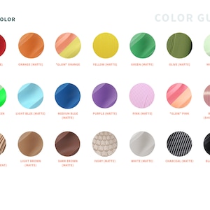 May include: Color guide with a variety of solid colors, including red, orange, yellow, green, blue, purple, pink, and black. Each color is displayed in a circular shape with its name and finish type, such as matte or metallic.