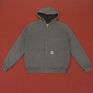 May include: A gray zip-up hooded sweatshirt with a Carhartt logo patch on the left chest. The sweatshirt has a kangaroo pocket and a drawstring hood.