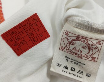 Camiseta de moda con diseño bordado de la marca japonesa Evisu