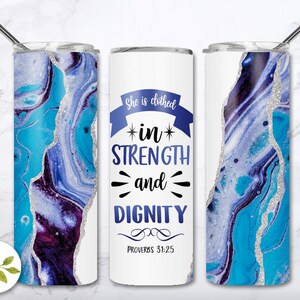 May include: A white stainless steel tumbler with a blue and purple marble design. The tumbler has a quote that reads "She is clothed in strength and dignity" with the scripture reference "Proverbs 31:25".