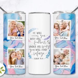 May include: A white stainless steel tumbler with a blue and pink marble design. The tumbler has three photo inserts with family photos and the text "HE WILL cover you WITH HIS feathers & UNDER HIS wings You WILL FIND refuge PSALM 91:4".