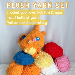 May include: A set of seven balls of plush yarn in various colours, including orange, yellow, red, pink, and blue. The yarn is arranged around a crocheted orange plush toy with a pink nose and blue eyes. The text "PLUSH YARN SET" is at the top of the image. The text "Crochet your own Fat Fire Dragon" is below the title. The text "Incl. 7 balls of yarn" is below that. The text "Pattern sold separately" is below that.