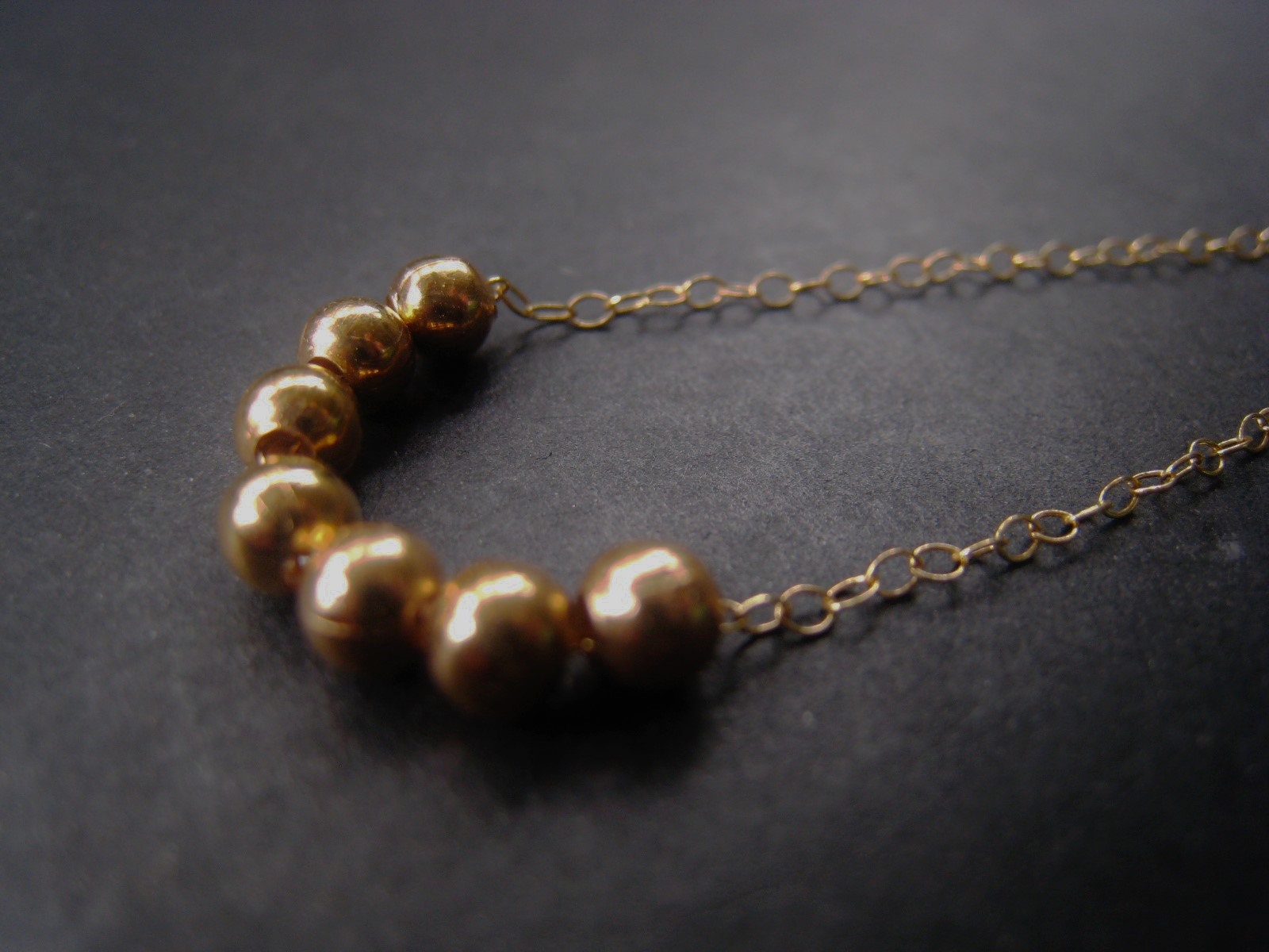 Add a bead shop gold necklace 14k