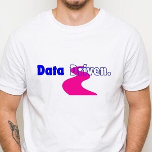 May include: White t-shirt with the text "Data Driven." in blue and a pink road graphic.