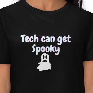 May include: Black t-shirt with white text that reads "Tech can get spooky" and a white ghost graphic.