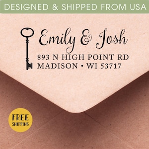 May include: A black and white return address stamp with a key design and the text "Emily & Josh", "893 N HIGH POINT RD", "MADISON WI 53717".