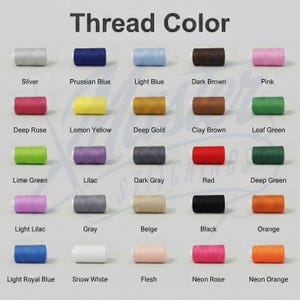 May include: A colour chart showing a range of thread colours, such as silver, Prussian blue, light blue, dark brown, and pink. Other colours include deep rose, lemon yellow, deep gold, clay brown, and leaf green. The text "Thread Colour" is at the top.